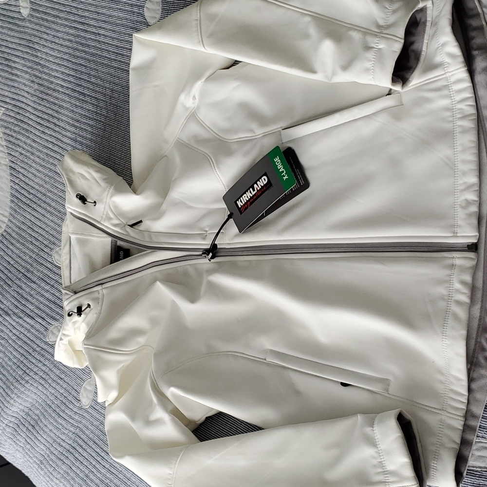 White Jacket. X large Kirkland brand. New with tag.